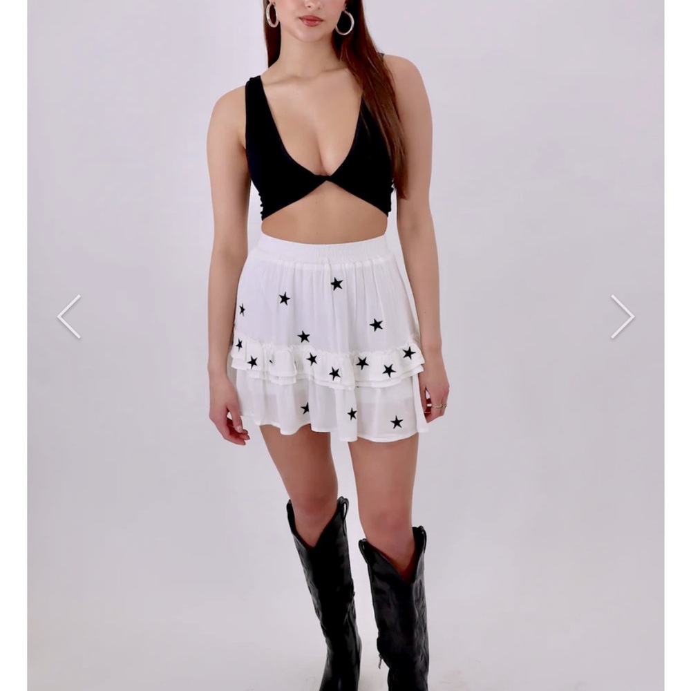 Rock N Rags boutique mini skirt, new with tags, star pattern; fits L-XL